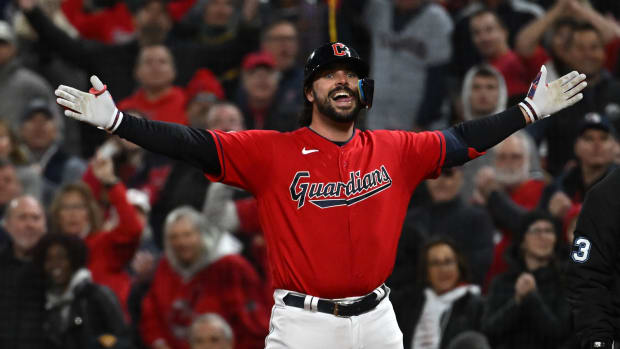 Oct 15, 2022; Cleveland, Ohio, USA; Cleveland Guardians catcher Austin Hedges (17) reacts after hitting a single against the New York Yankees in the second inning during game three of the NLDS for the 2022 MLB Playoffs at Progressive Field.